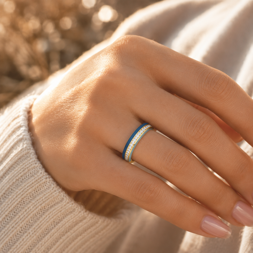 18K gold CVD diamond enamel ring VVS clarity luxury ring closeup hand shot with blue enamel detail
