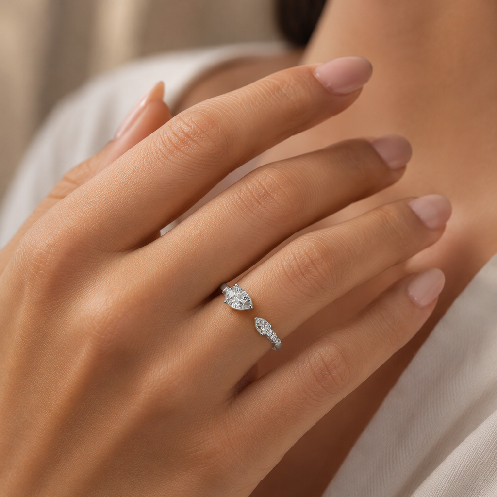 Woman wearing 925 silver pear shape diamond ring elegant minimal luxury