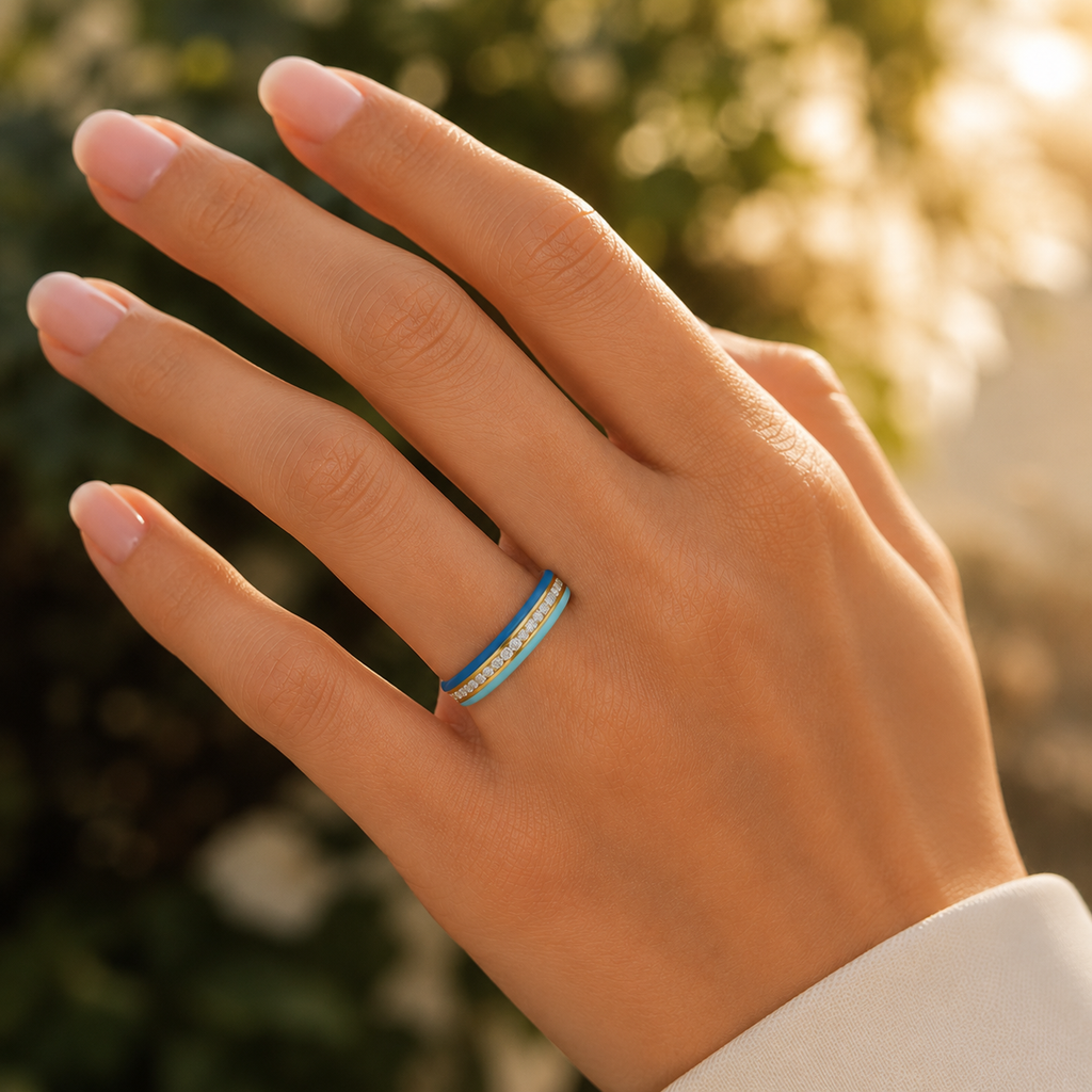 18K gold CVD diamond enamel ring VVS EF clarity closeup hand shot with blue enamel detailing