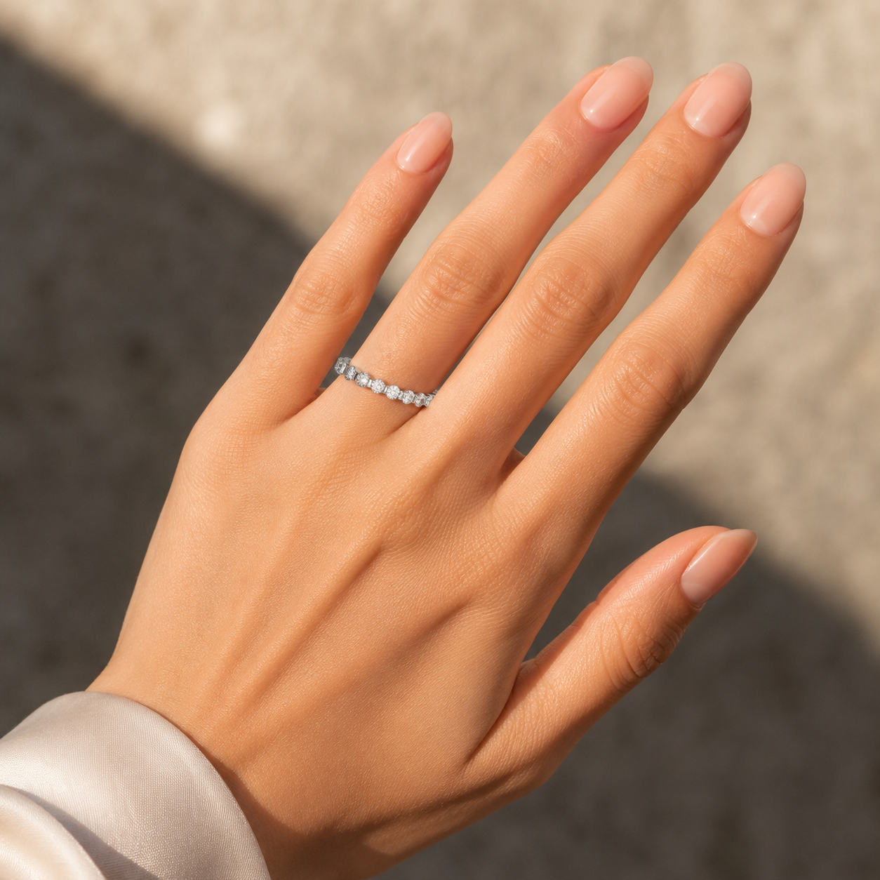 925 silver VVS CVD diamond half eternity ring worn on hand closeup