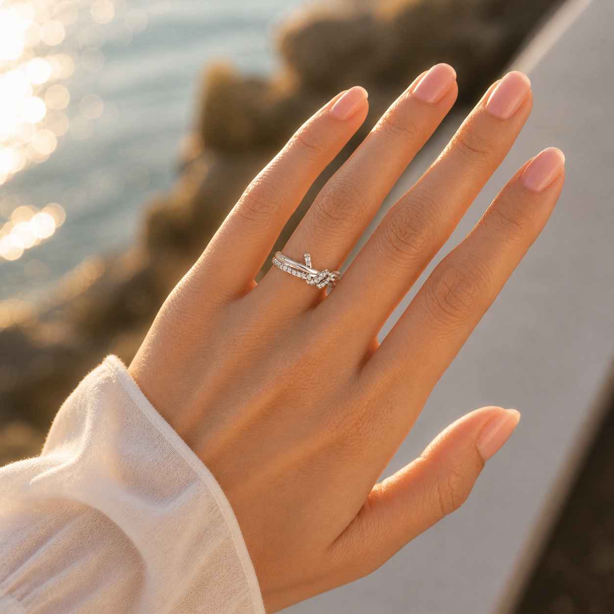 Lab Grown Diamond Infinity Love Knot Ring Lifestyle Hand Shot