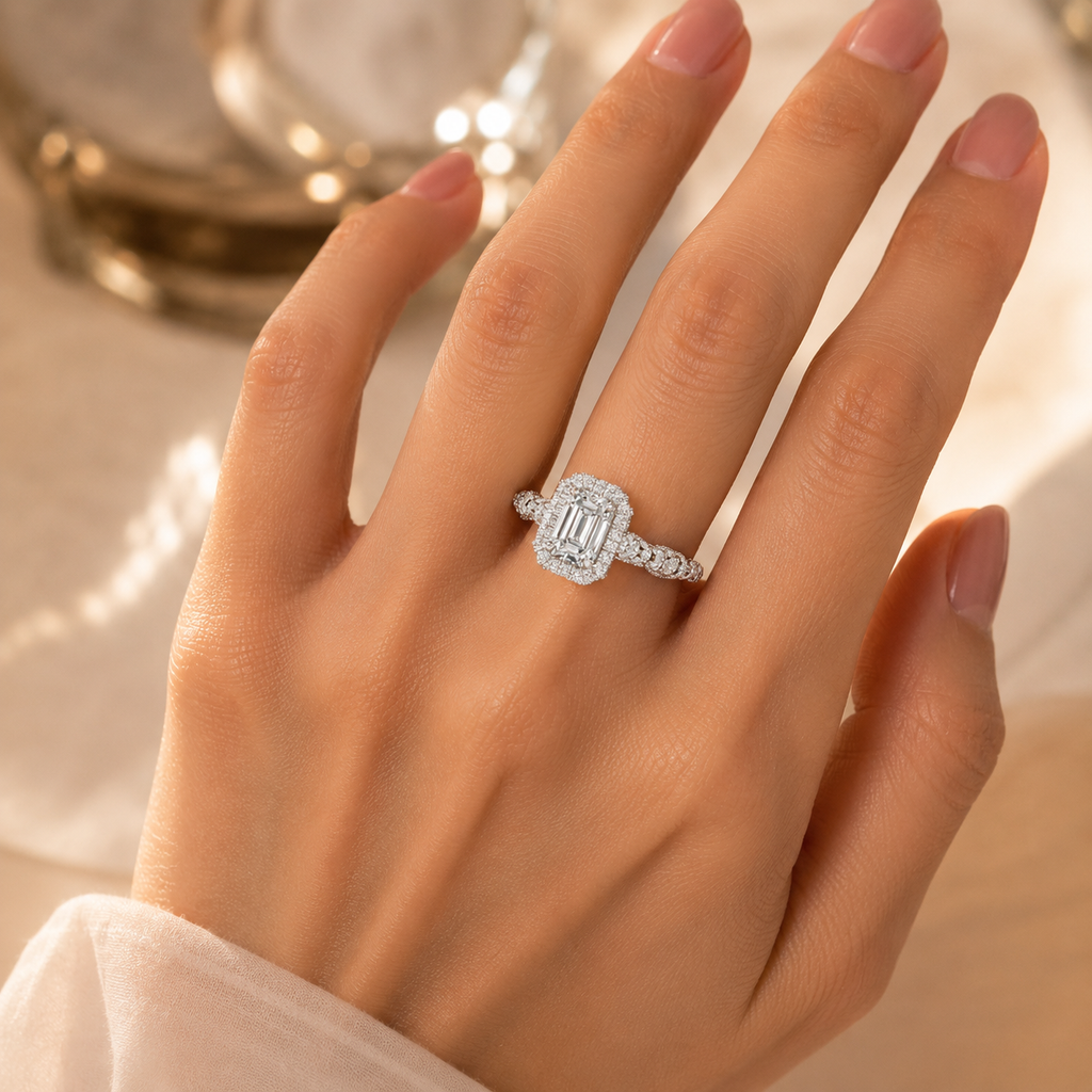 Emerald Cut Halo Engagement Ring Worn on Hand Close-Up