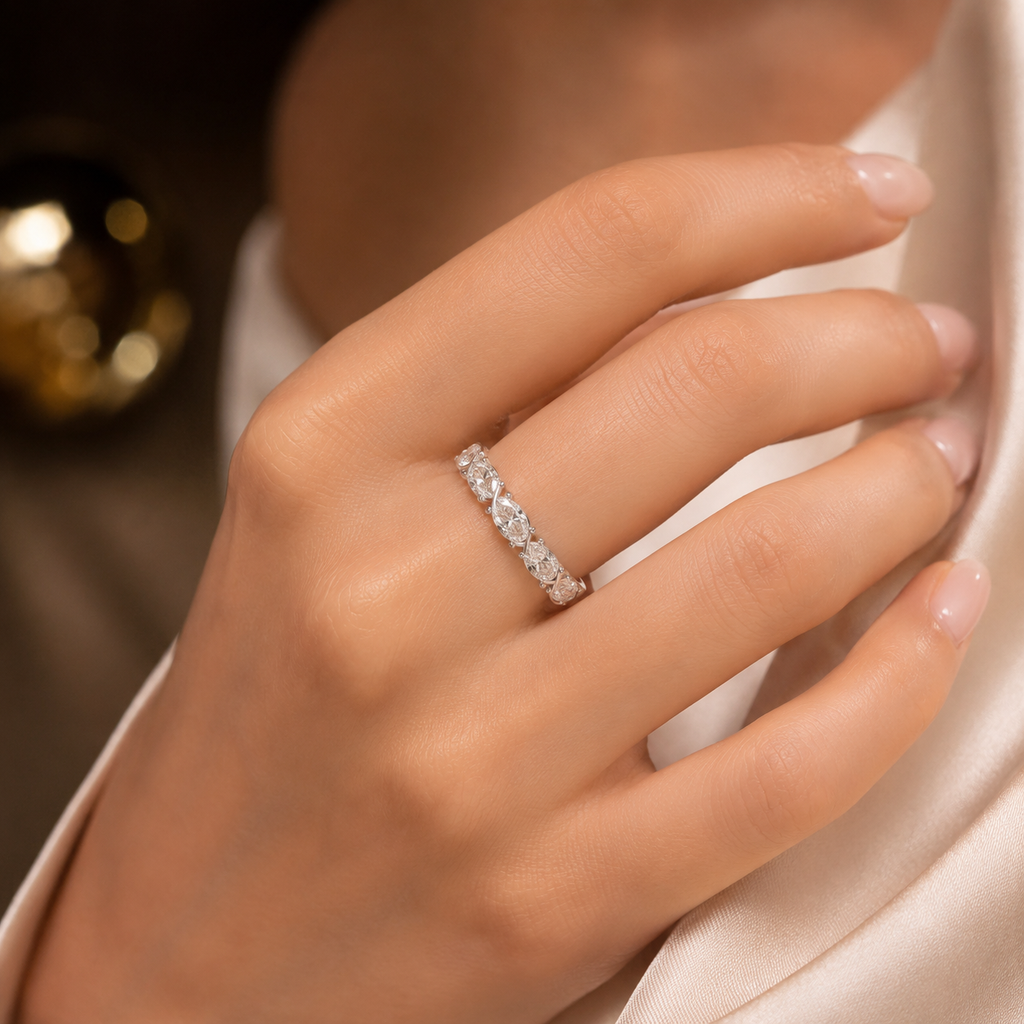 Woman wearing 925 silver oval diamond eternity ring luxury VVS band